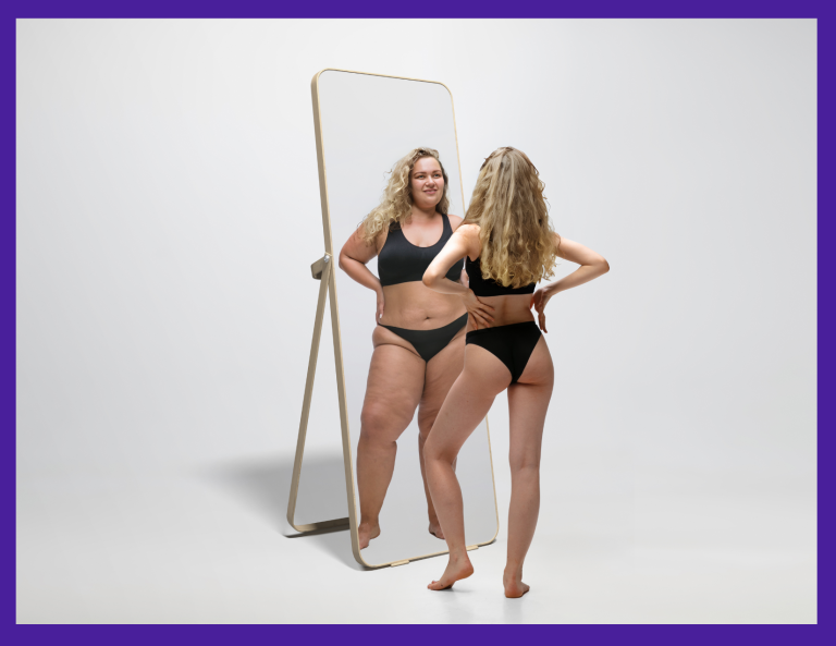 Woman looking in mirror