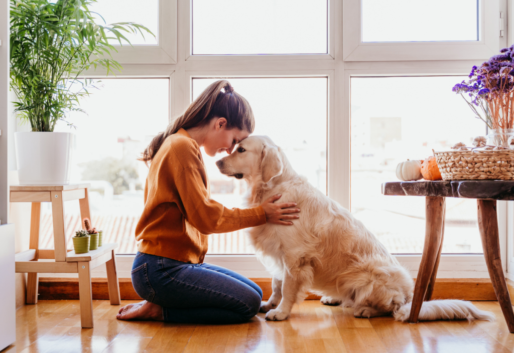 woman loving her dog